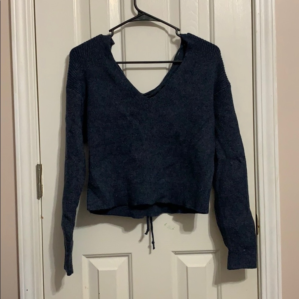 Tied back blue crop sweater